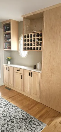 a spacious bedroom with a large bed and a chandelier