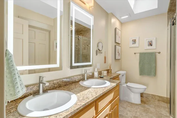 a view of a chairs and table in the patio