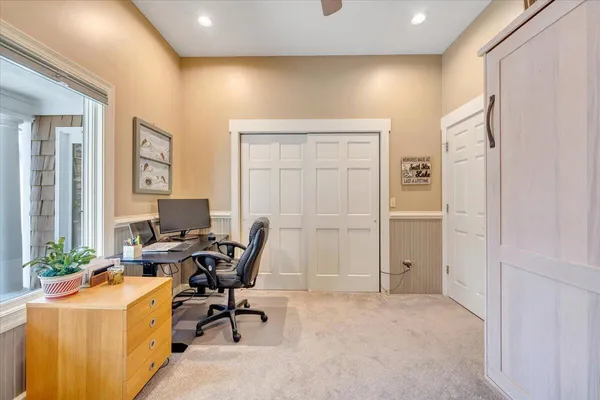 a view of house with yard swimming pool and outdoor seating