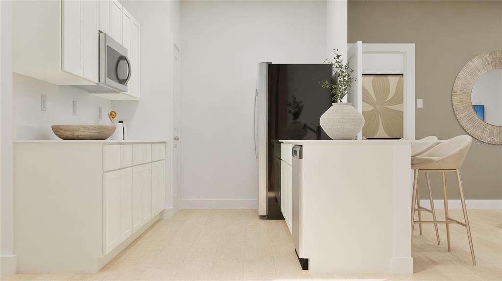 5108 Flaxleaf Street St. Cloud, FL 34772 - Photo 24 of 31 a utility room with cabinets washer and dryer
