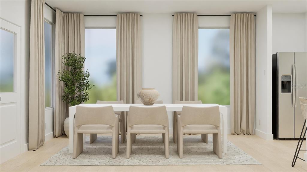 5108 Flaxleaf Street St. Cloud, FL 34772 - Photo 4 of 31 a view of a dining room with furniture and a potted plant