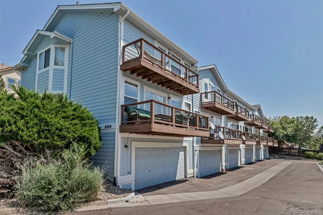 a view of a building with a street