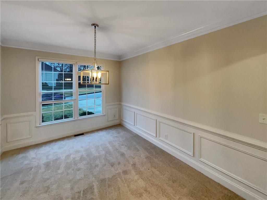 37 Ashdowne Way Acworth, GA 30101 - Photo 12 of 31 a view of an empty room with windows