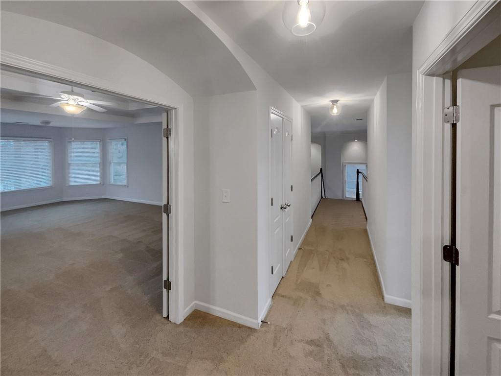 37 Ashdowne Way Acworth, GA 30101 - Photo 15 of 31 a view of a hallway with wooden floor