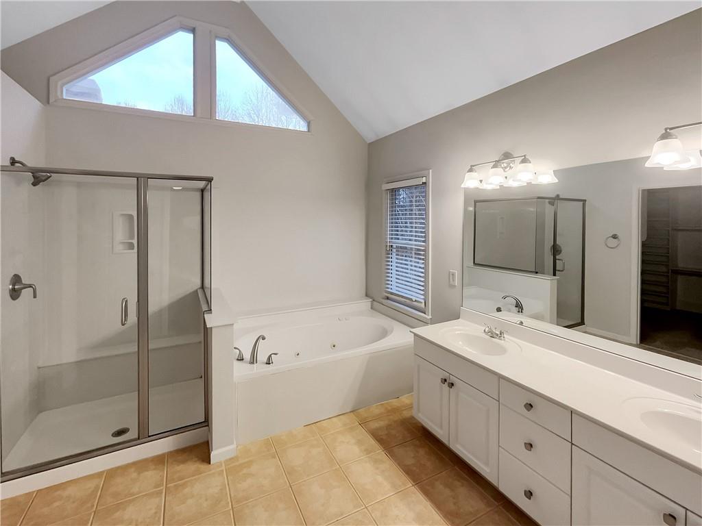 37 Ashdowne Way Acworth, GA 30101 - Photo 20 of 31 a spacious bathroom with a tub sink and mirror
