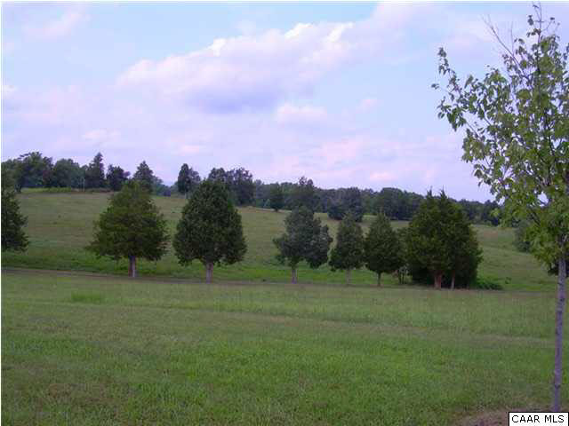 5 Frays Ridge Road Charlottesville, VA 22901 - Photo 8 of 9 a view of a grassy field with trees in the background