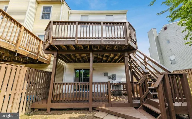 a view of a balcony with furniture