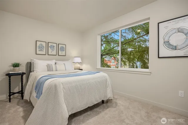 a bathroom with a toilet a sink and a mirror