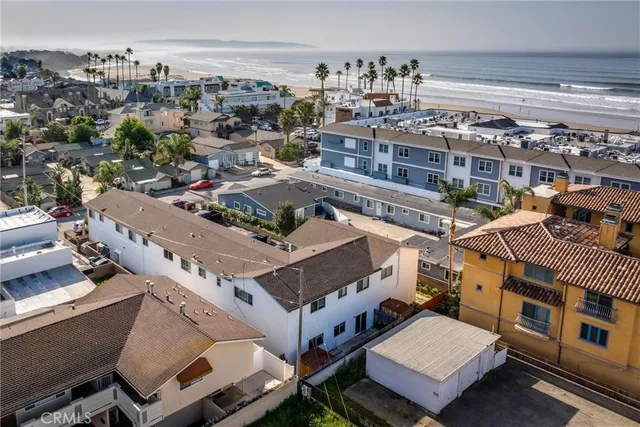 an aerial view of residential houses and outdoor space