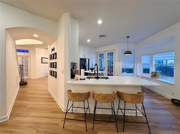 a view of a kitchen and dining room
