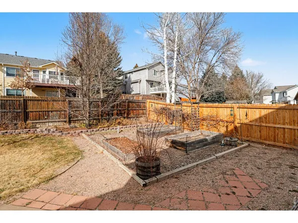a swimming pool with outdoor seating and yard