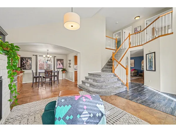 a view of entryway livingroom and hall