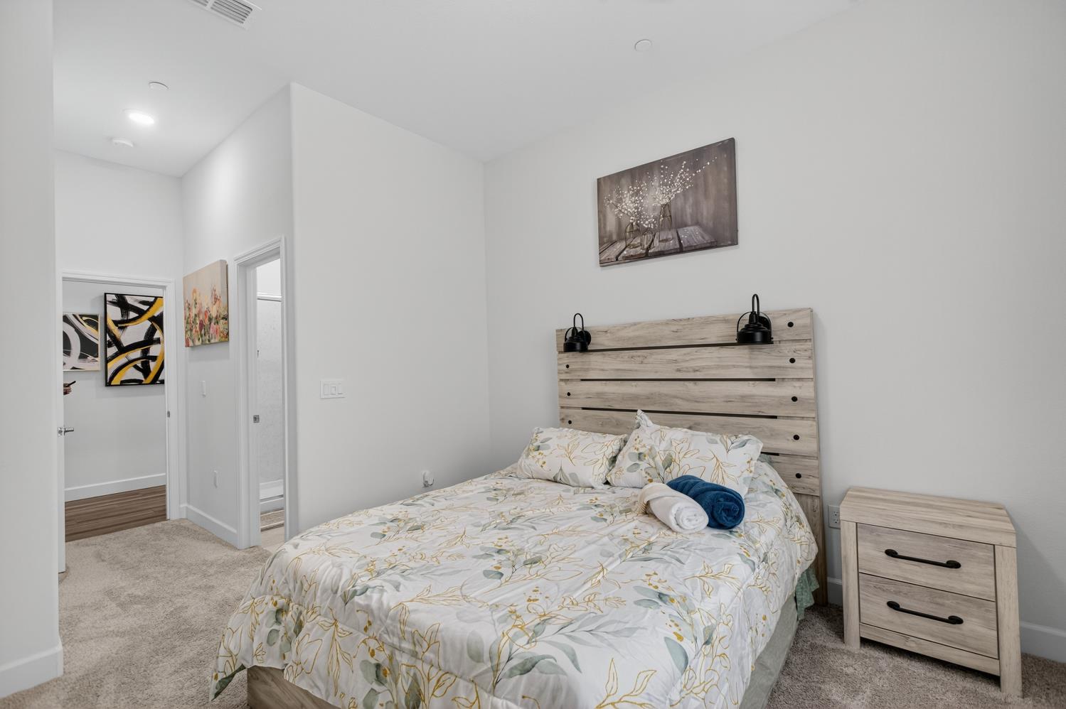 5603 Drifton Way Sacramento, CA 95835 - Photo 12 of 49 a bedroom with a bed and a couch