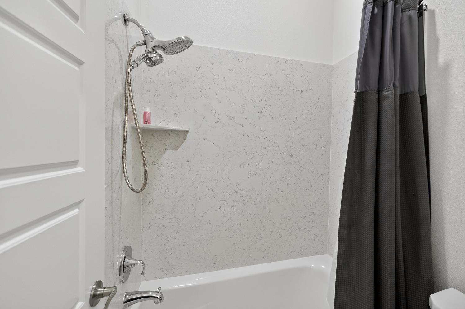 5603 Drifton Way Sacramento, CA 95835 - Photo 18 of 49 a bathroom with a shower