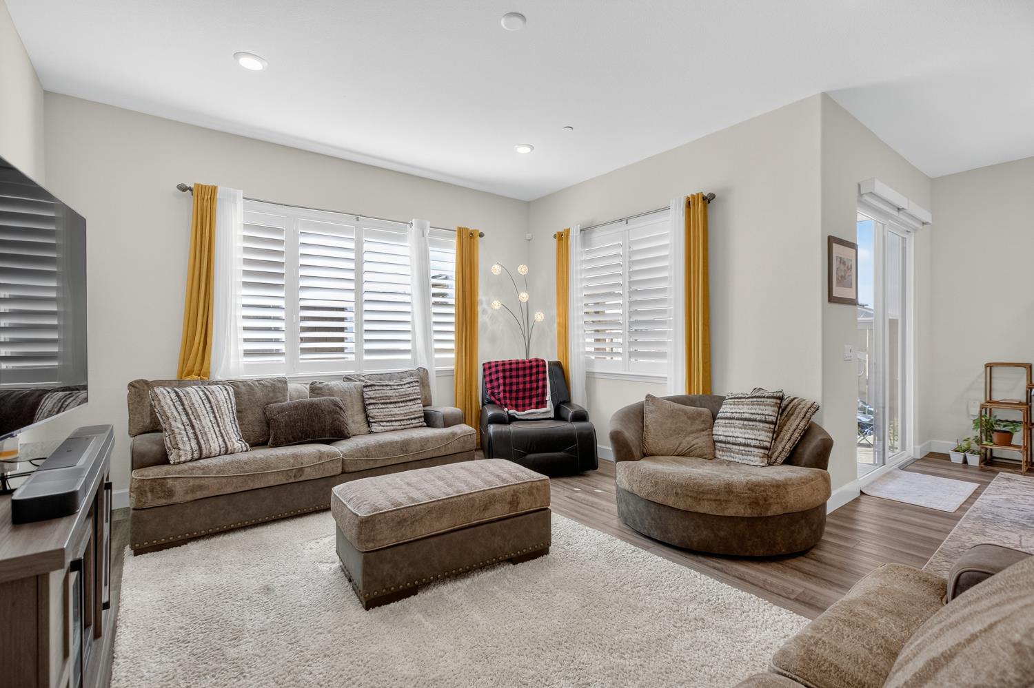 5603 Drifton Way Sacramento, CA 95835 - Photo 29 of 49 a living room with furniture and a large window