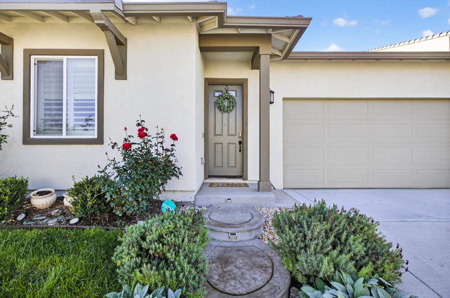 5603 Drifton Way Sacramento, CA 95835 - Photo 4 of 49 a front view of a house with a yard