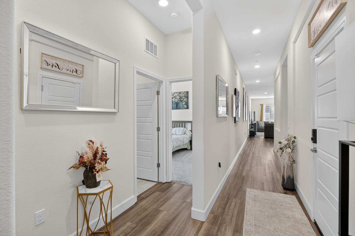 5603 Drifton Way Sacramento, CA 95835 - Photo 7 of 49 a living room with furniture and a chandelier