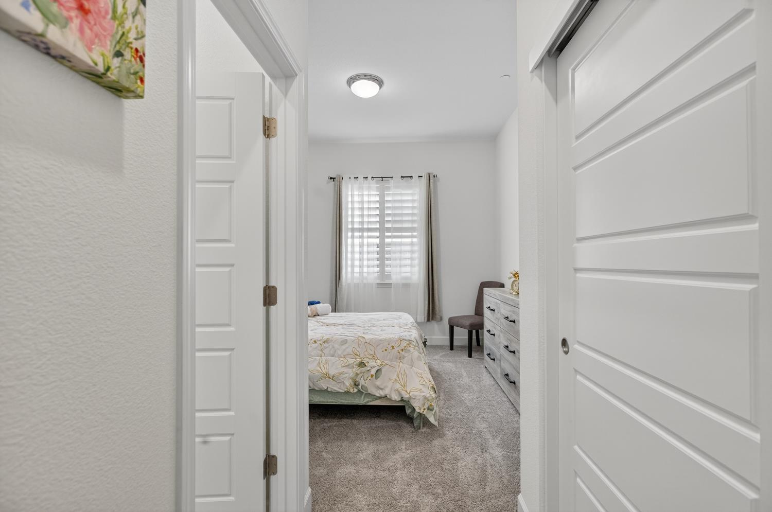 5603 Drifton Way Sacramento, CA 95835 - Photo 9 of 49 a bedroom with a bed and a window