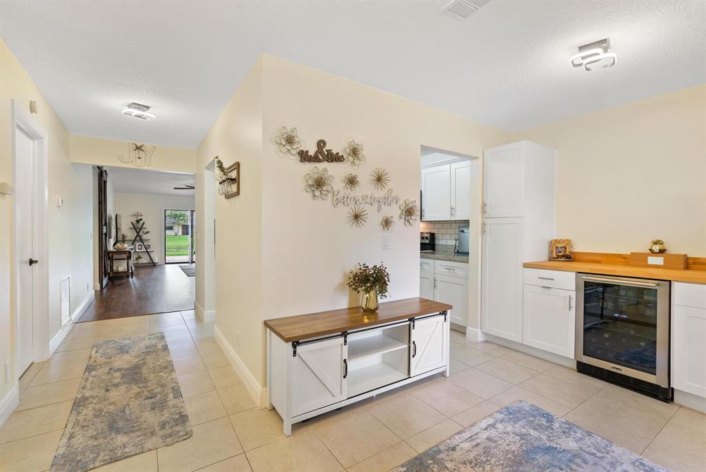 6734 Bridlewood Court, Unit 6734 Boca Raton, FL 33433 - Photo 17 of 42 a living room with furniture and a fireplace