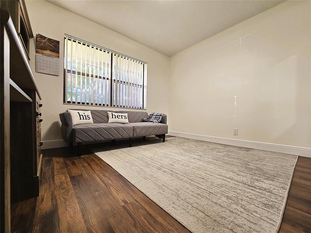 6734 Bridlewood Court, Unit 6734 Boca Raton, FL 33433 - Photo 24 of 42 a bedroom with a bed and a large window