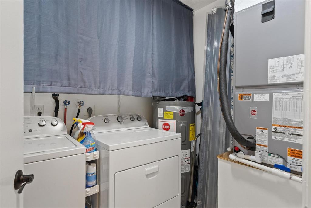 6734 Bridlewood Court, Unit 6734 Boca Raton, FL 33433 - Photo 26 of 42 a utility room with dryer and washer