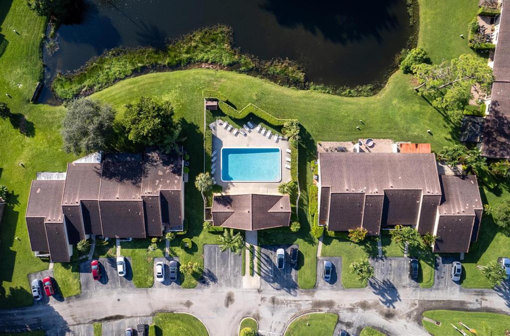 6734 Bridlewood Court, Unit 6734 Boca Raton, FL 33433 - Photo 35 of 42 an aerial view of a house with swimming pool and outdoor seating