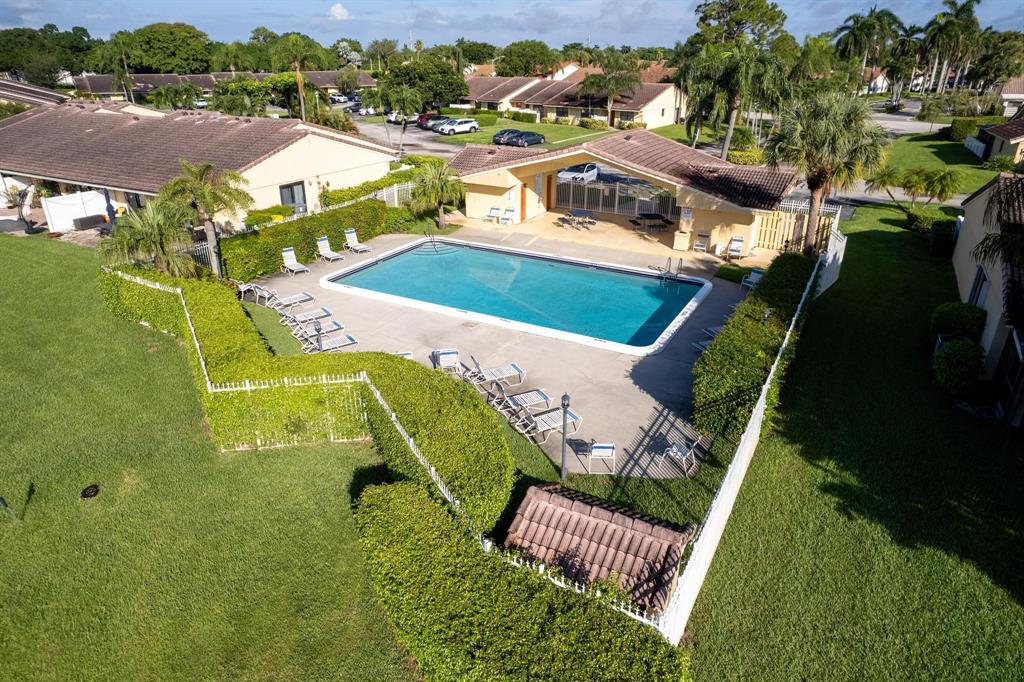 6734 Bridlewood Court, Unit 6734 Boca Raton, FL 33433 - Photo 39 of 42 a view of a swimming pool with a patio
