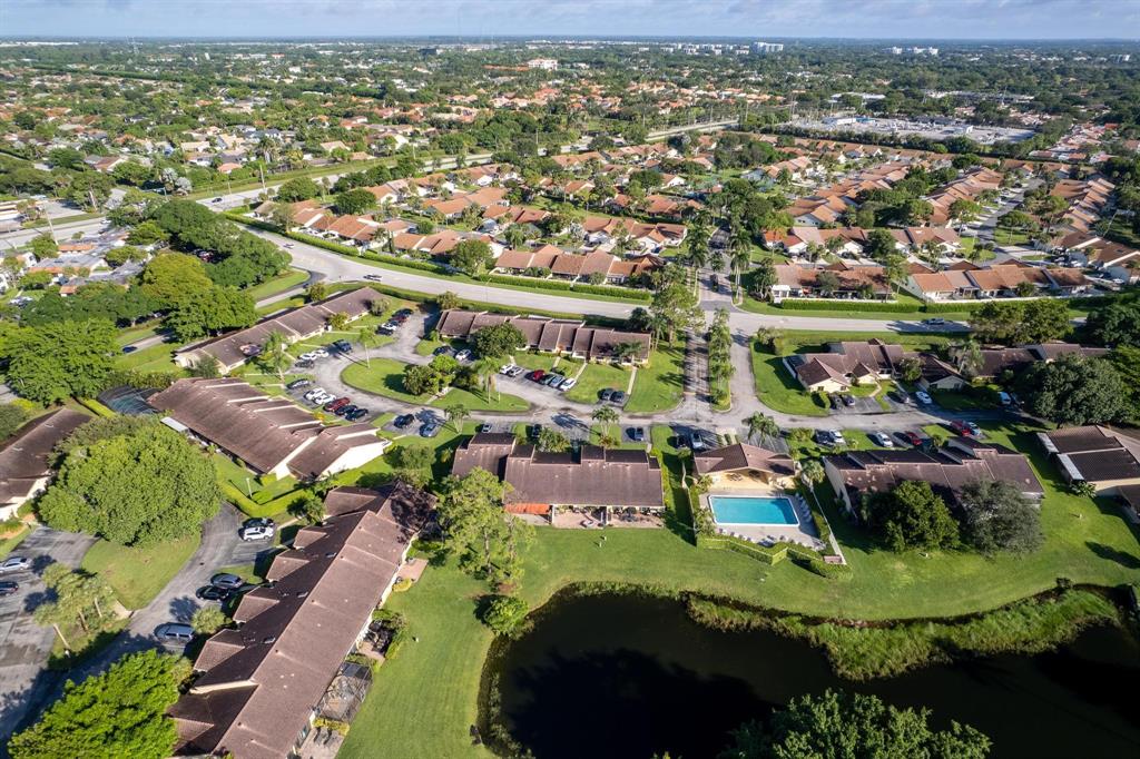 6734 Bridlewood Court, Unit 6734 Boca Raton, FL 33433 - Photo 40 of 42 an aerial view of residential houses with outdoor space and river