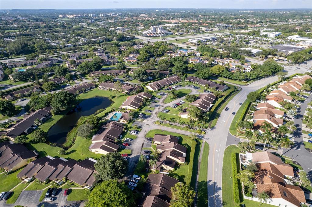 6734 Bridlewood Court, Unit 6734 Boca Raton, FL 33433 - Photo 42 of 42 an aerial view of a city with lots of residential buildings