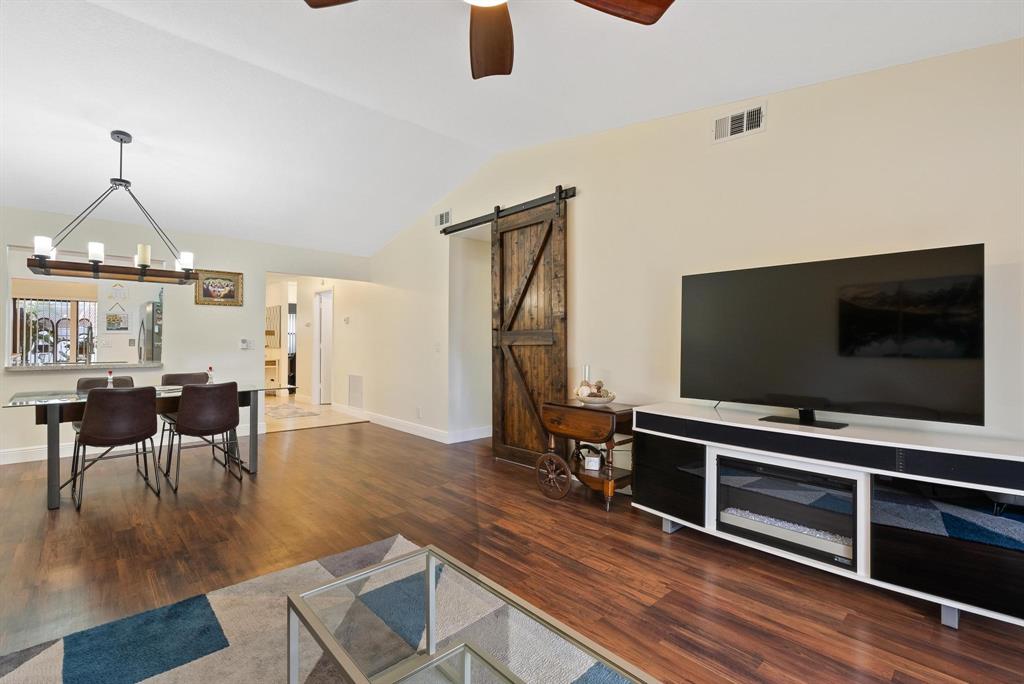 6734 Bridlewood Court, Unit 6734 Boca Raton, FL 33433 - Photo 8 of 42 a living room with furniture and a flat screen tv