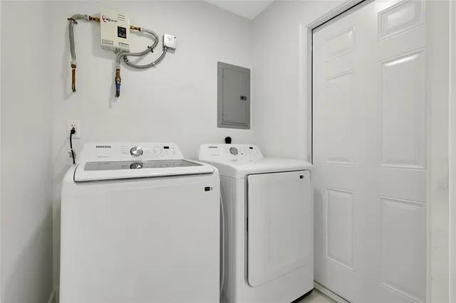 a utility room with dryer and washer