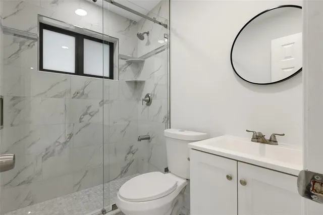 a view of an outdoor space with wooden floor