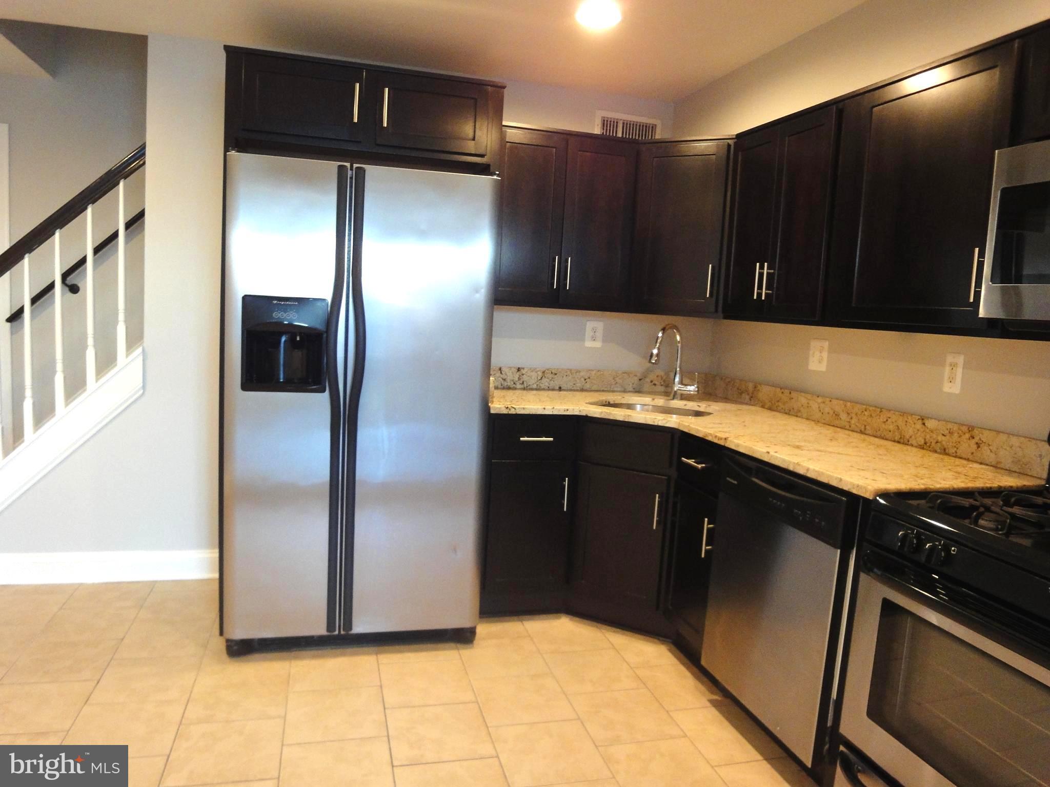 1803 Dunmere Road Baltimore, MD 21222 - Photo 8 of 14 Kitchen with tile flooring