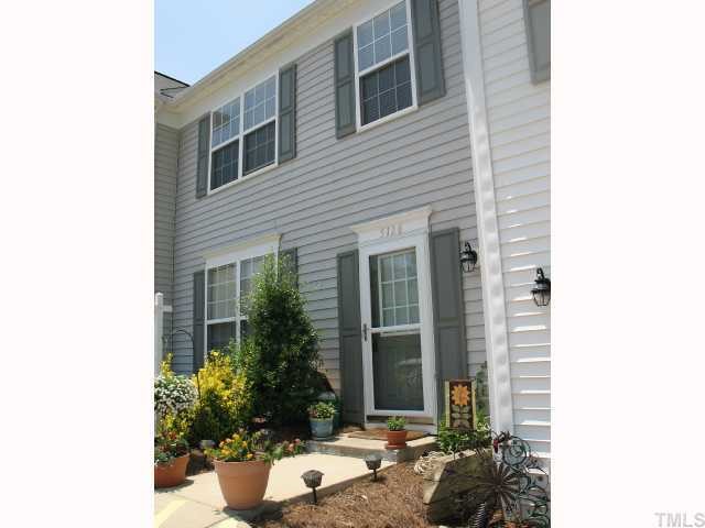 5126 Echo Ridge Road Raleigh, NC 27612 - Photo 1 of 10 a view of a house with backyard and sitting area
