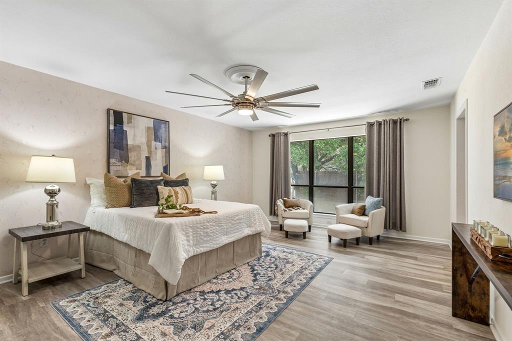 24 Legend Road Benbrook, TX 76132 - Photo 13 of 28 a bedroom with a large bed and a window