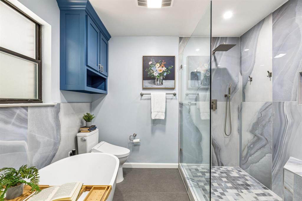 24 Legend Road Benbrook, TX 76132 - Photo 16 of 28 a bathroom with a sink and a mirror