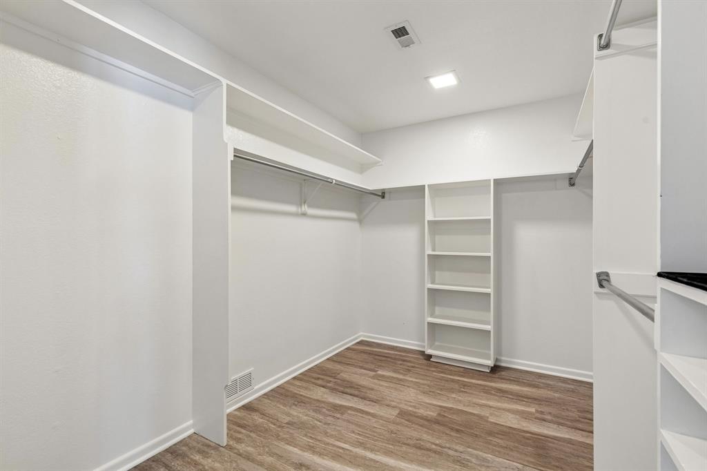 24 Legend Road Benbrook, TX 76132 - Photo 19 of 28 a view of an empty walk in closet