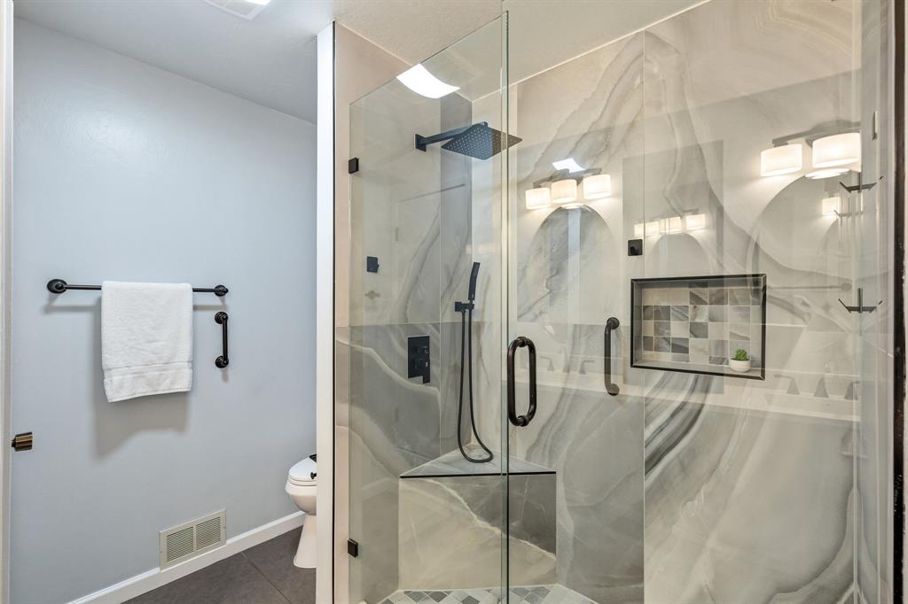 24 Legend Road Benbrook, TX 76132 - Photo 24 of 28 a bathroom with a shower