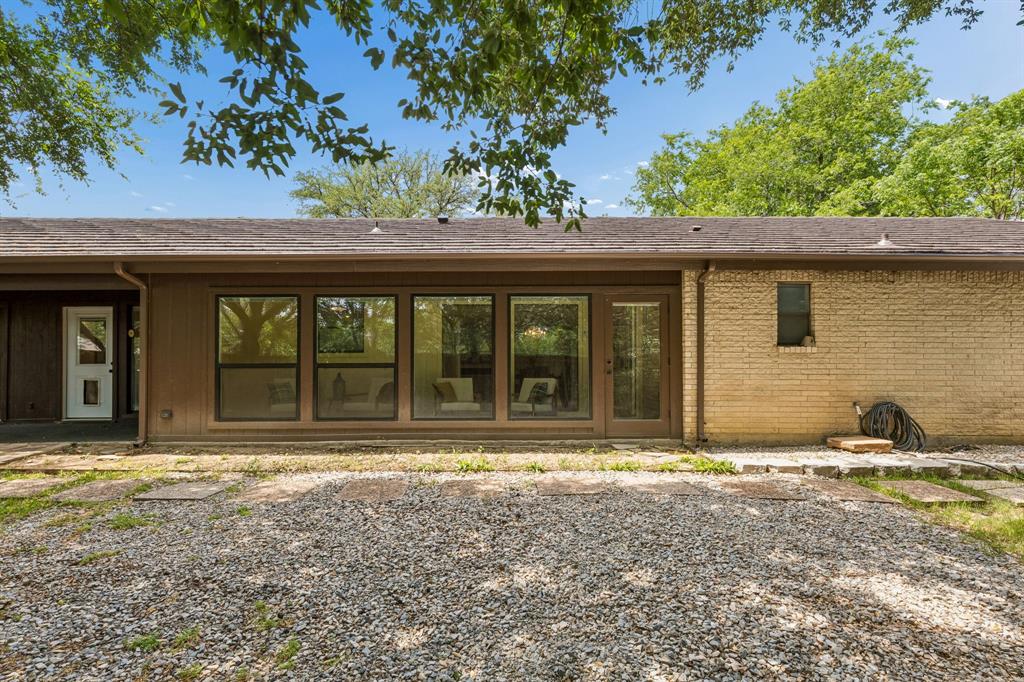 24 Legend Road Benbrook, TX 76132 - Photo 25 of 28 a front view of a house with a yard