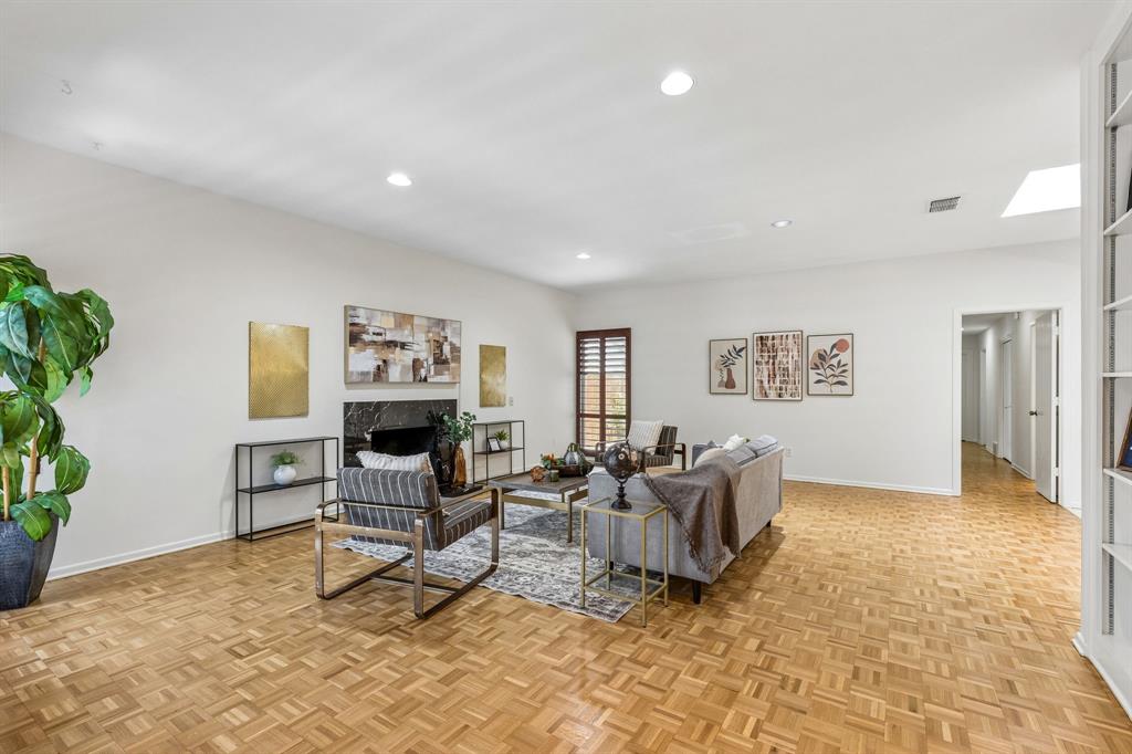 24 Legend Road Benbrook, TX 76132 - Photo 7 of 28 a living room with furniture a fireplace and a potted plant