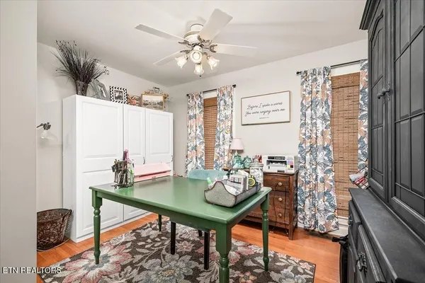 a view of a livingroom with furniture and window