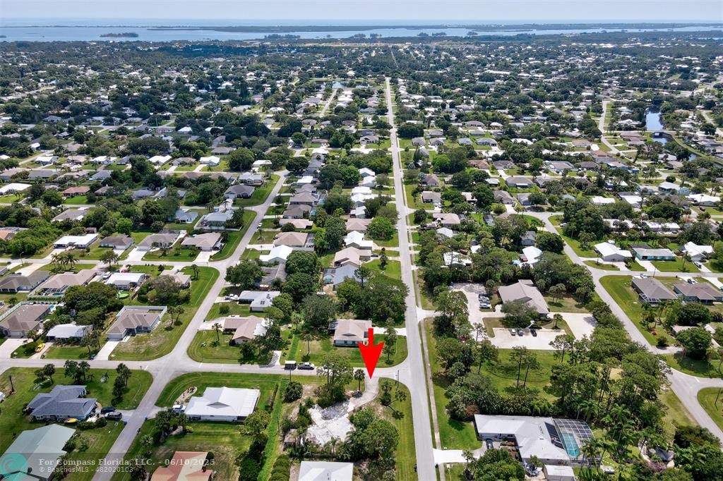 702 Lake Drive Sebastian, FL 32958 - Photo 7 of 14 an aerial view of residential houses with outdoor space and trees
