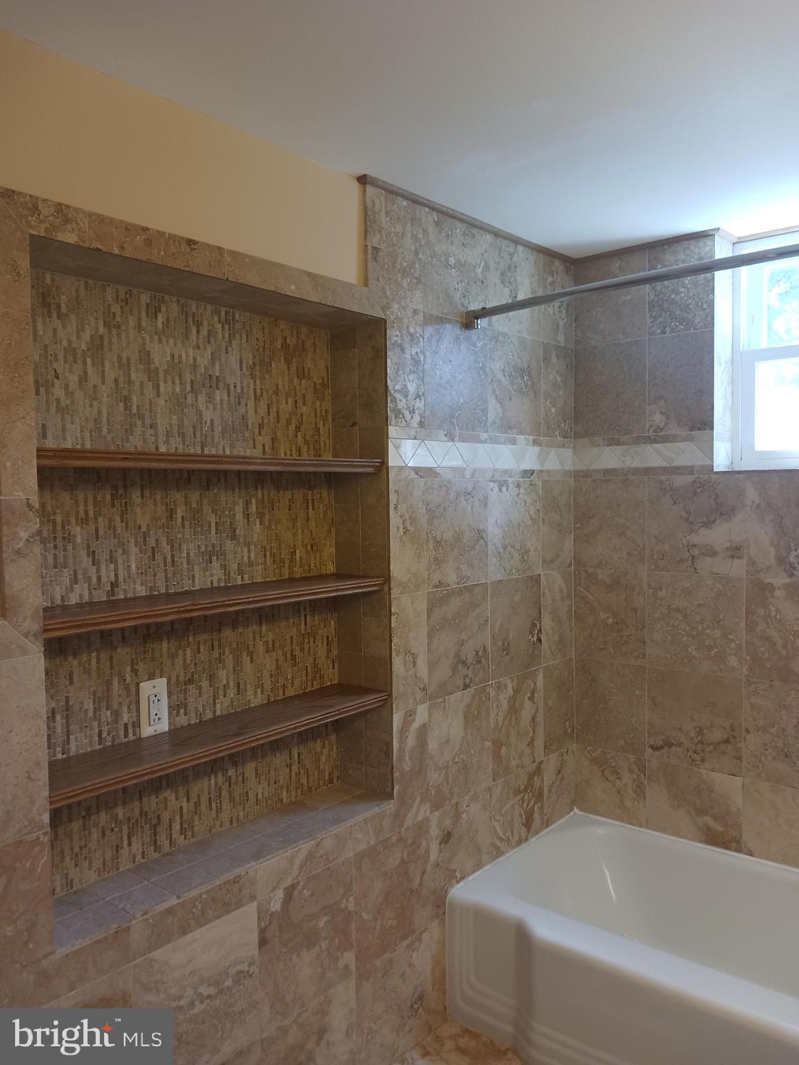 11110 Midvale Road Kensington, MD 20895 - Photo 20 of 32 built-in shelves in bathroom