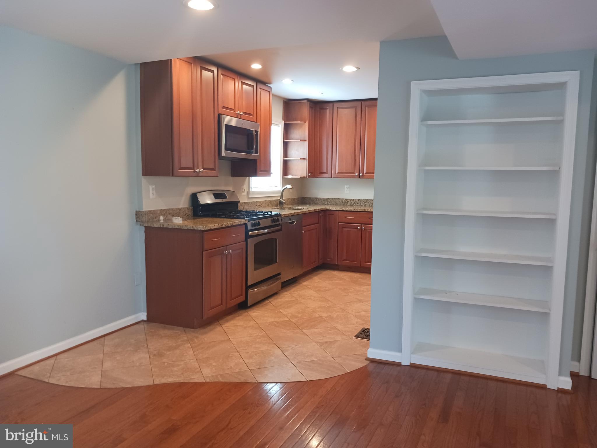 11110 Midvale Road Kensington, MD 20895 - Photo 6 of 32 Built-in shelf and entrance to kitchen