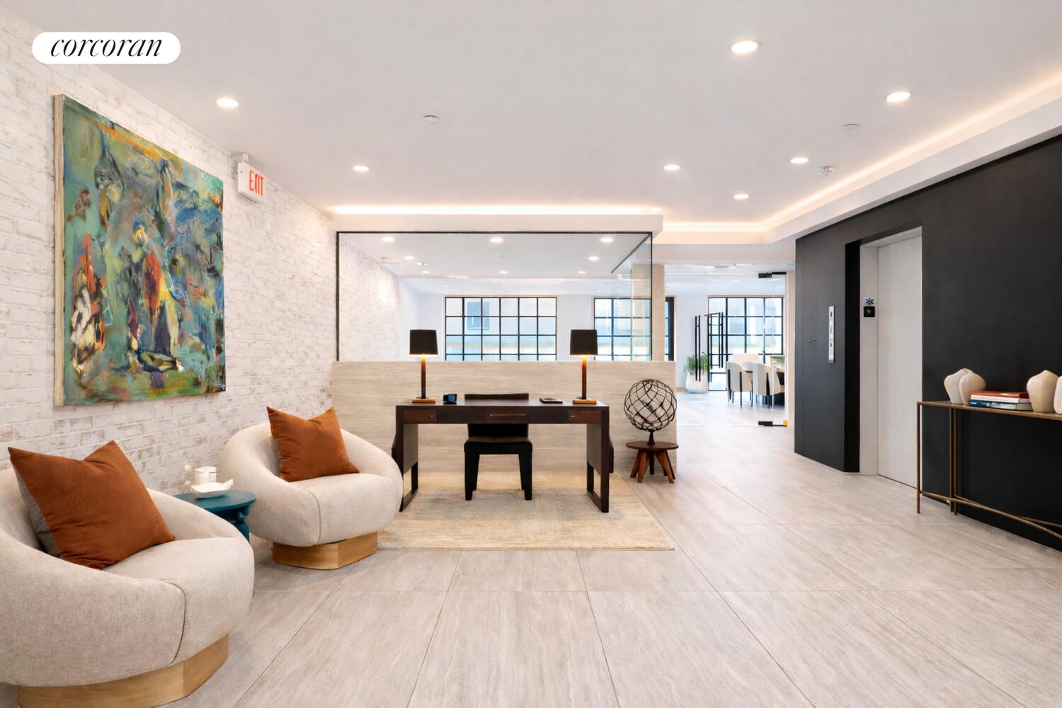 420 East 75th Street, Unit 2 Manhattan, NY 10021 - Photo 14 of 22 a living room with furniture and wooden floor