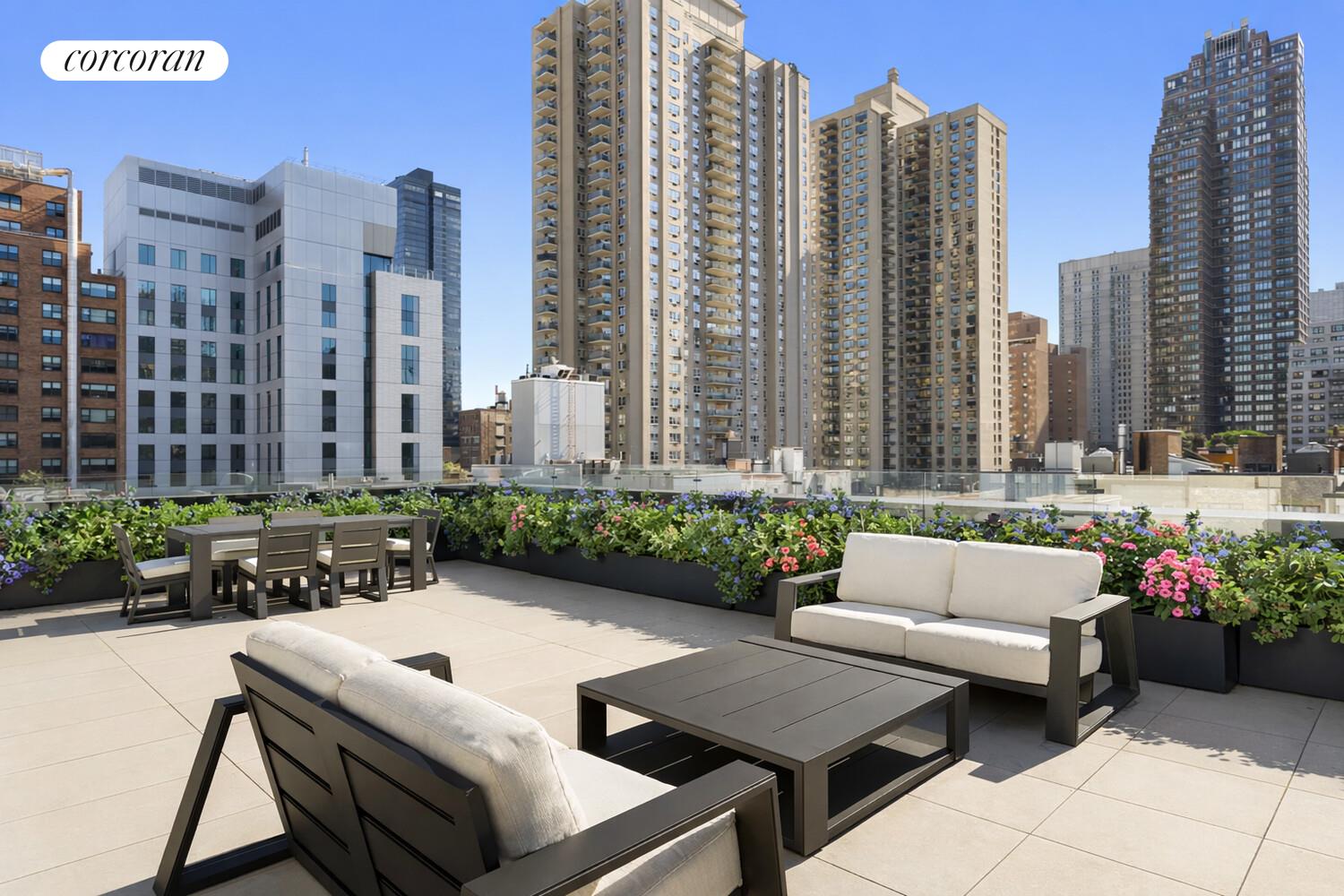 420 East 75th Street, Unit 2 Manhattan, NY 10021 - Photo 16 of 22 a view of a patio with couches and a fire pit