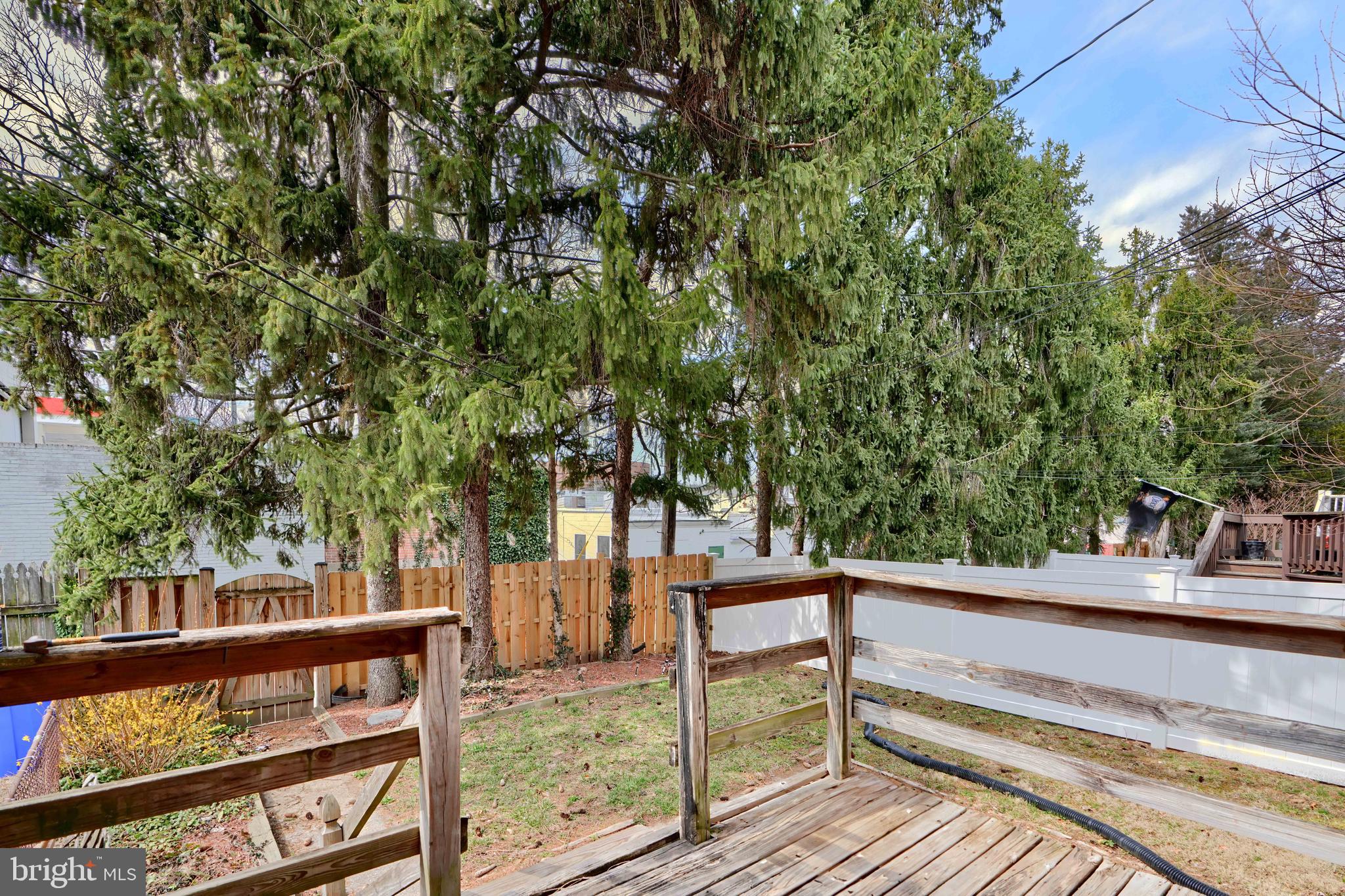 910 Radcliffe Road Towson, MD 21204 - Photo 13 of 32 a view of a wooden deck and trees