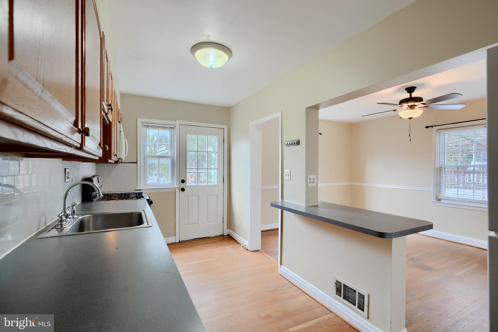 910 Radcliffe Road Towson, MD 21204 - Photo 10 of 32 a view of a kitchen with a sink and cabinets
