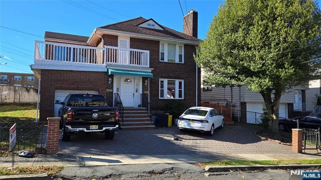 a car parked in front of a house