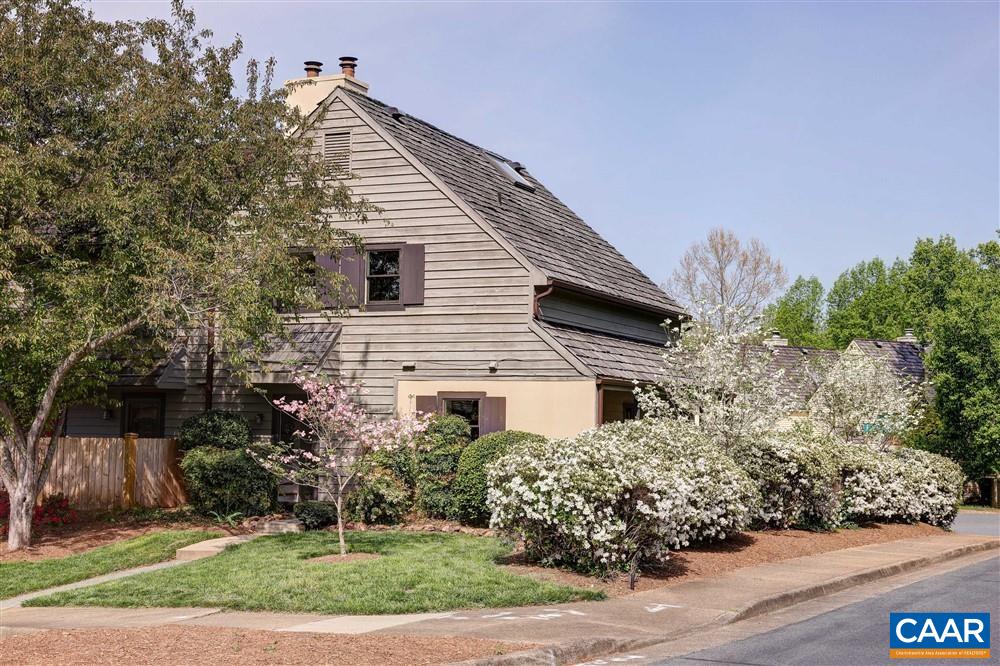 700 Merion Greene Charlottesville, VA 22901 - Photo 1 of 40 a front view of a house with garden